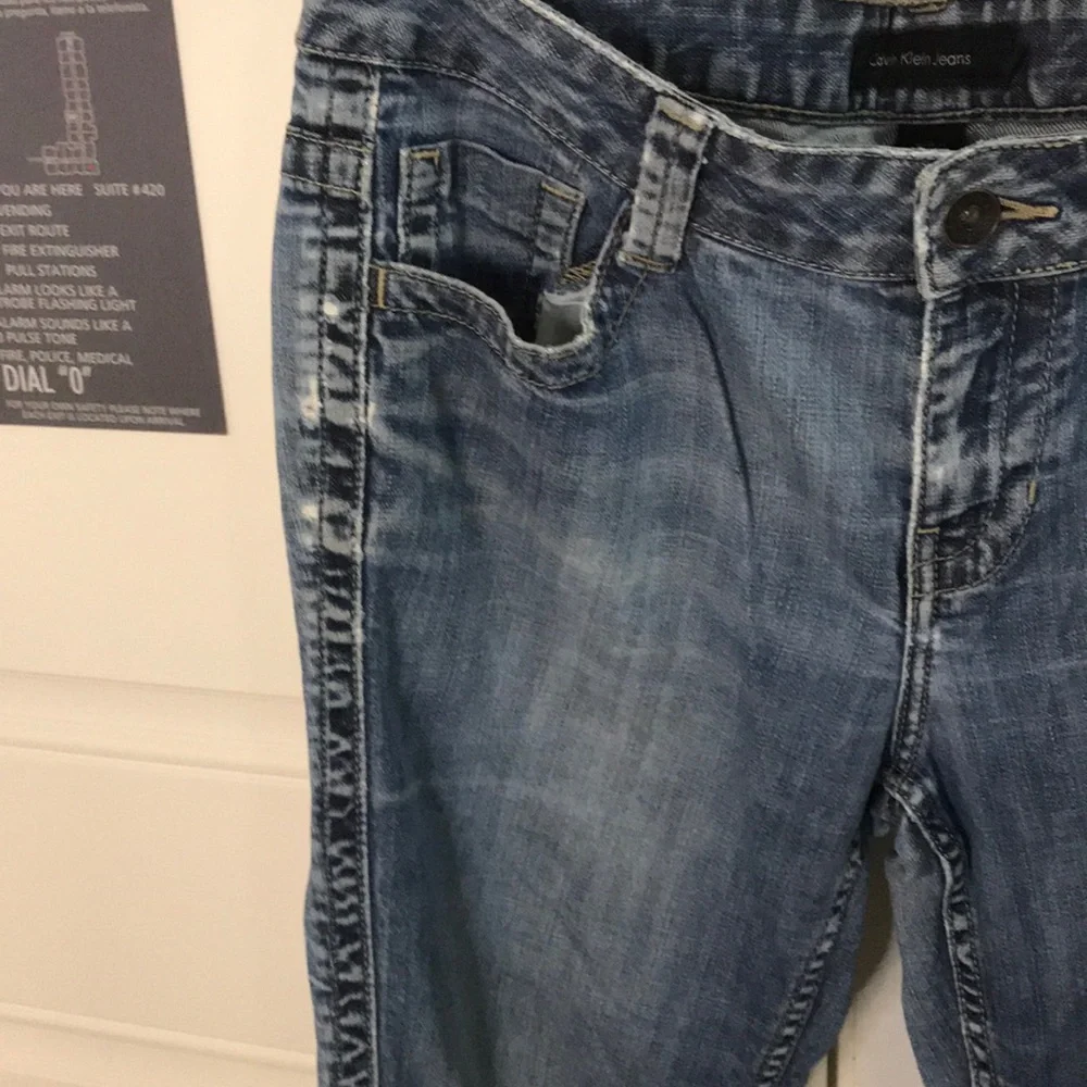 Calvin Klein distressed medium dark wash jeans 10